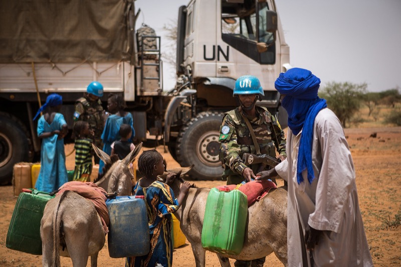 MINUSMA peacekeepers conduct civil-military cooperation activities with the local community in Gao, Mali